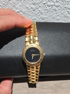Gucci 3300.2.L Gold Tone Watch with Black Dial